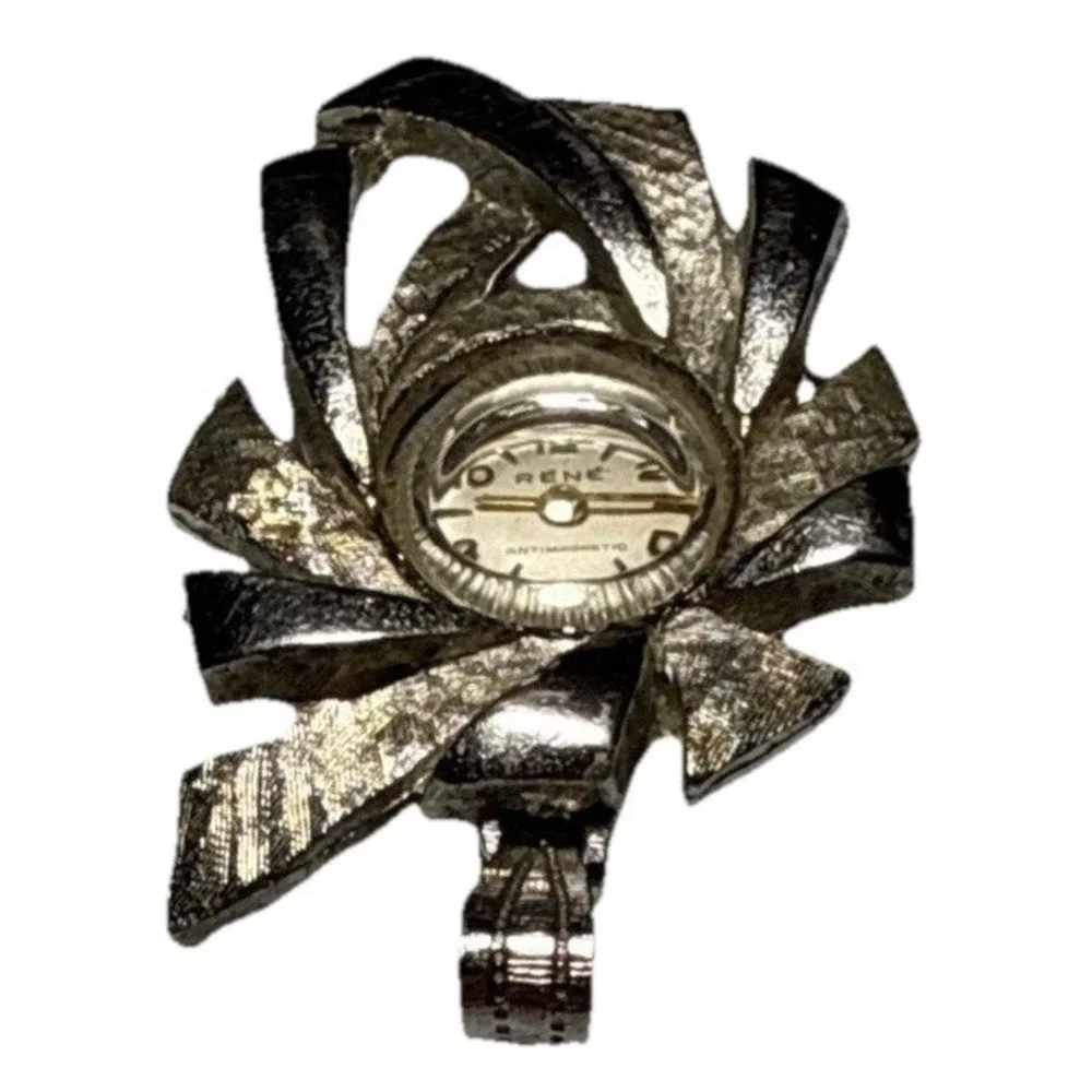 Vtg René antimagnetic textured silvertone abstract ribbon design Watch J21-3